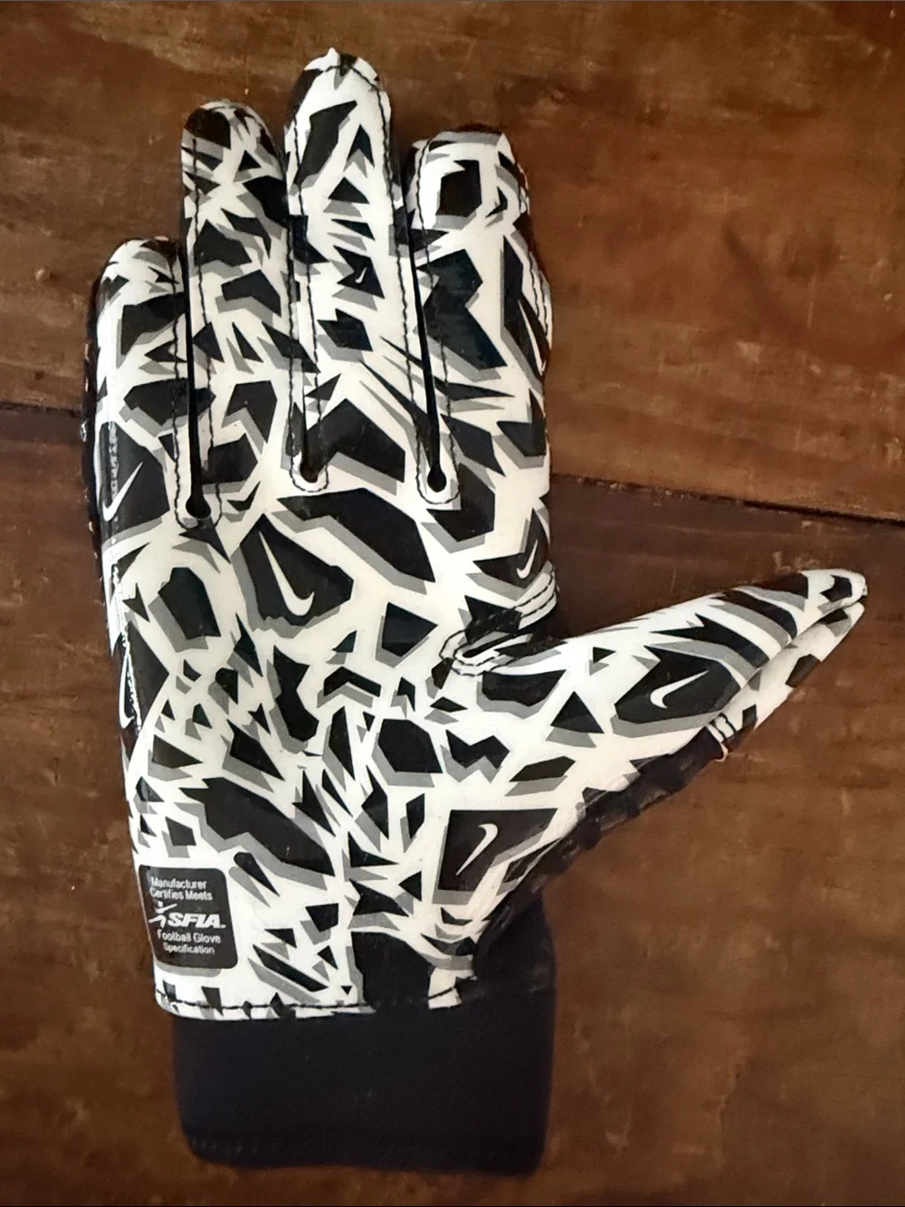 Nike Black Youth Shark Football Gloves with White Swoosh